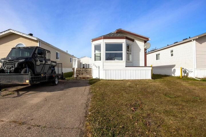 Property Photo:  115 Cree Lane  AB T9K 1Y5 