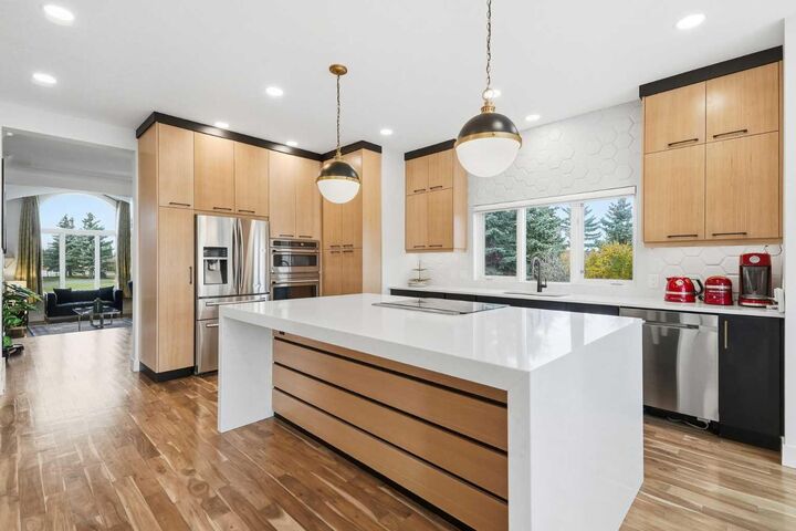 Property Photo:  28 Bearspaw Acres  AB T3R 1H7 