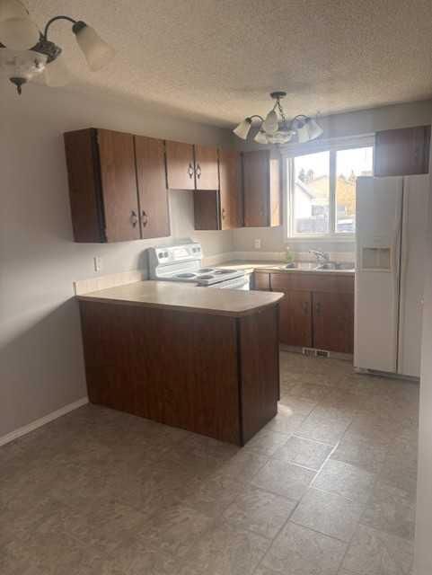 Property Photo:  4207 54 Avenue  AB T4G 1K4 