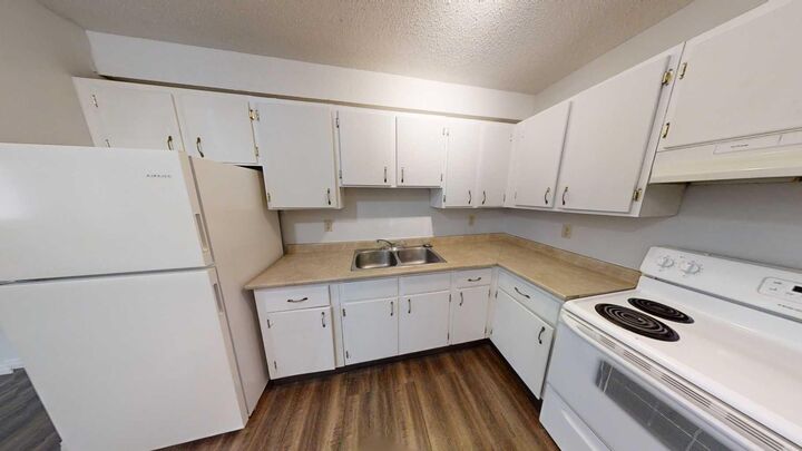 Property Photo:  5117 44 Street 210  AB T0G 1E0 