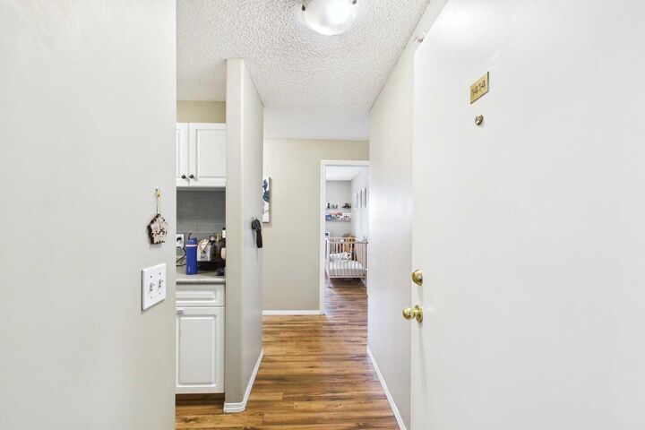 Property Photo:  6224 17 Avenue SE 1414  AB T2A 7X8 