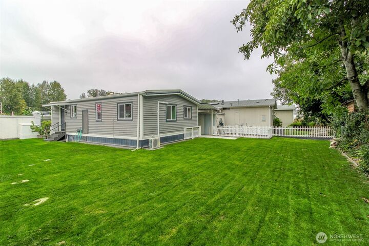 Property Photo: 10813 62nd Street Ct E 1 WA 98372