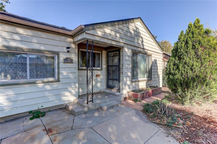 Property Photo:  1133 Kingston Street  CO 80010 