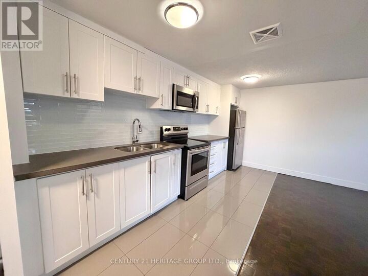 Property Photo:  7555 Goreway Drive 131  ON L4T 3M9 