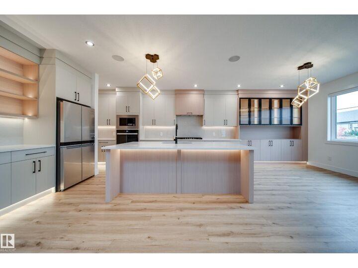 Property Photo: 3142 Magpie Wy NW AB T5S 0V4