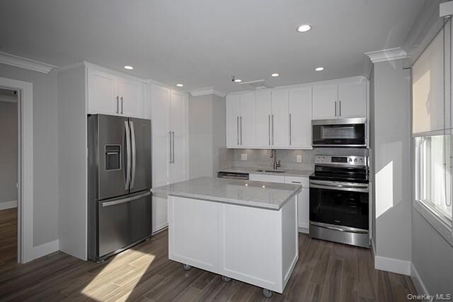 Property Photo:  37-5 New York Avenue 37-5  NY 11743 
