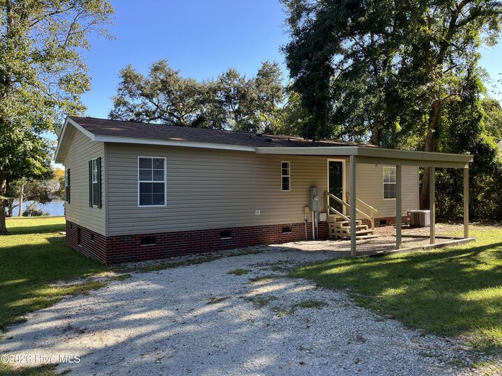 Property Photo:  720 Bay Harbor Drive  NC 28443 