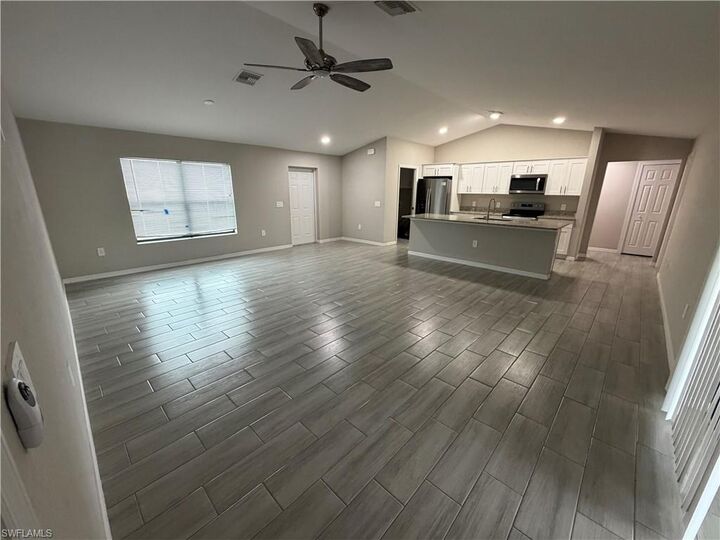 Property Photo: 113 NW 15th St FL 33993