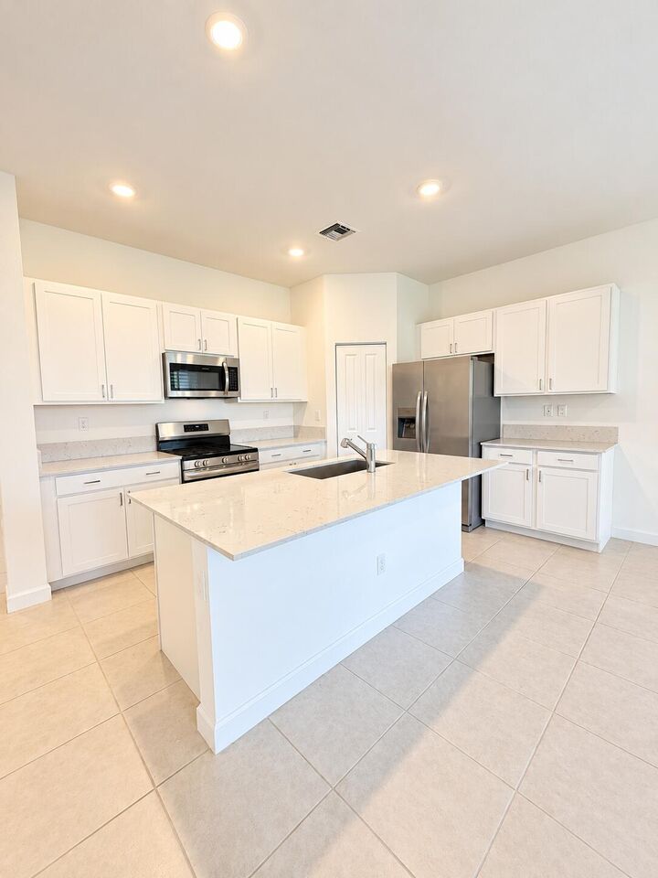 Property Photo: 4168 Lagoon Shore Drive FL 33467