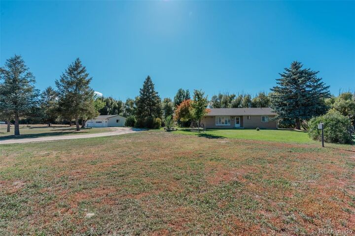 Property Photo:  7715 S State Highway 83  CO 80116 