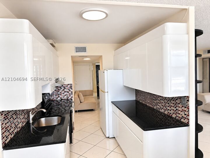 Property Photo:  250 174th St 420  FL 33160 