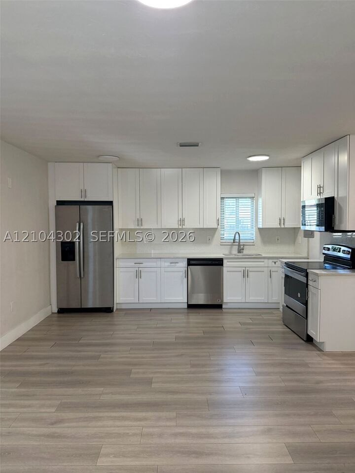 Property Photo:  9981 Jamaica Dr  FL 33189 