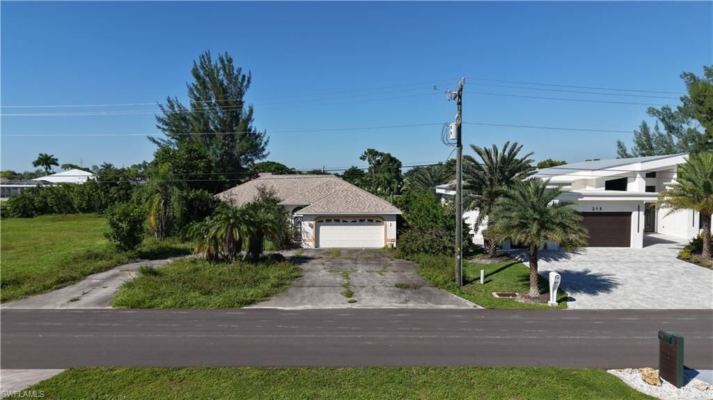 Property Photo:  209 SE 28th Ter  FL 33904 