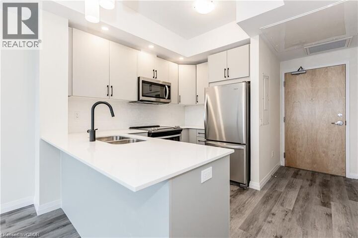Property Photo:  60 Charles Street 1803  ON N2G 0C9 