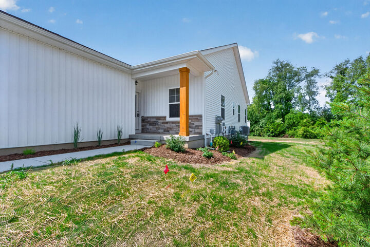 Property Photo:  812 Joyce Lane  MI 48879 