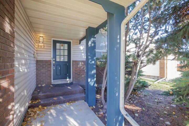 Property Photo:  383 Woodfield Road SW  AB T2W 3V8 