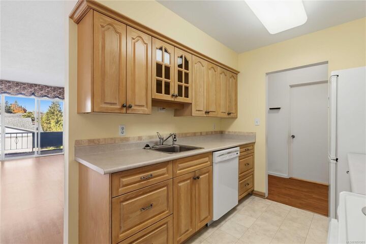 Property Photo:  9560 Fifth St #207  BC V8L 2W5 
