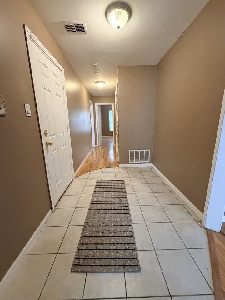 Property Photo:  1940 E 72nd Place 1st  IL 60649 
