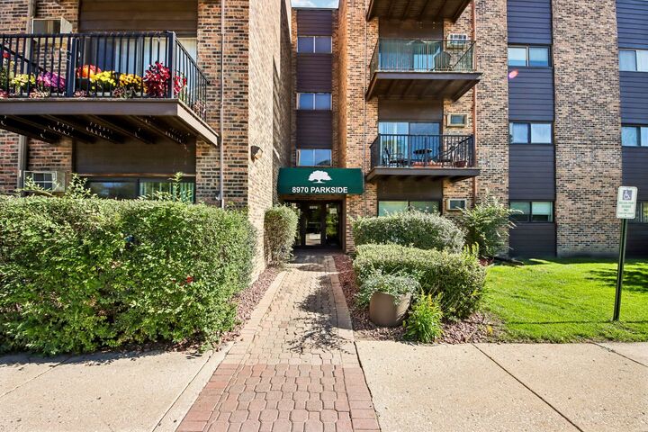 Property Photo:  8970 N Parkside Avenue 304  IL 60016 