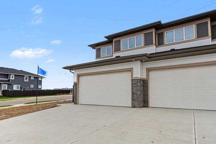 Property Photo:  303 Dawson Dock Way  AB T1X 2W4 