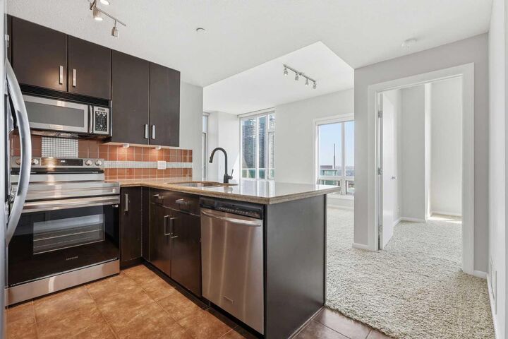 Property Photo:  1410 1 Street SE 1505  AB T2G 5T7 