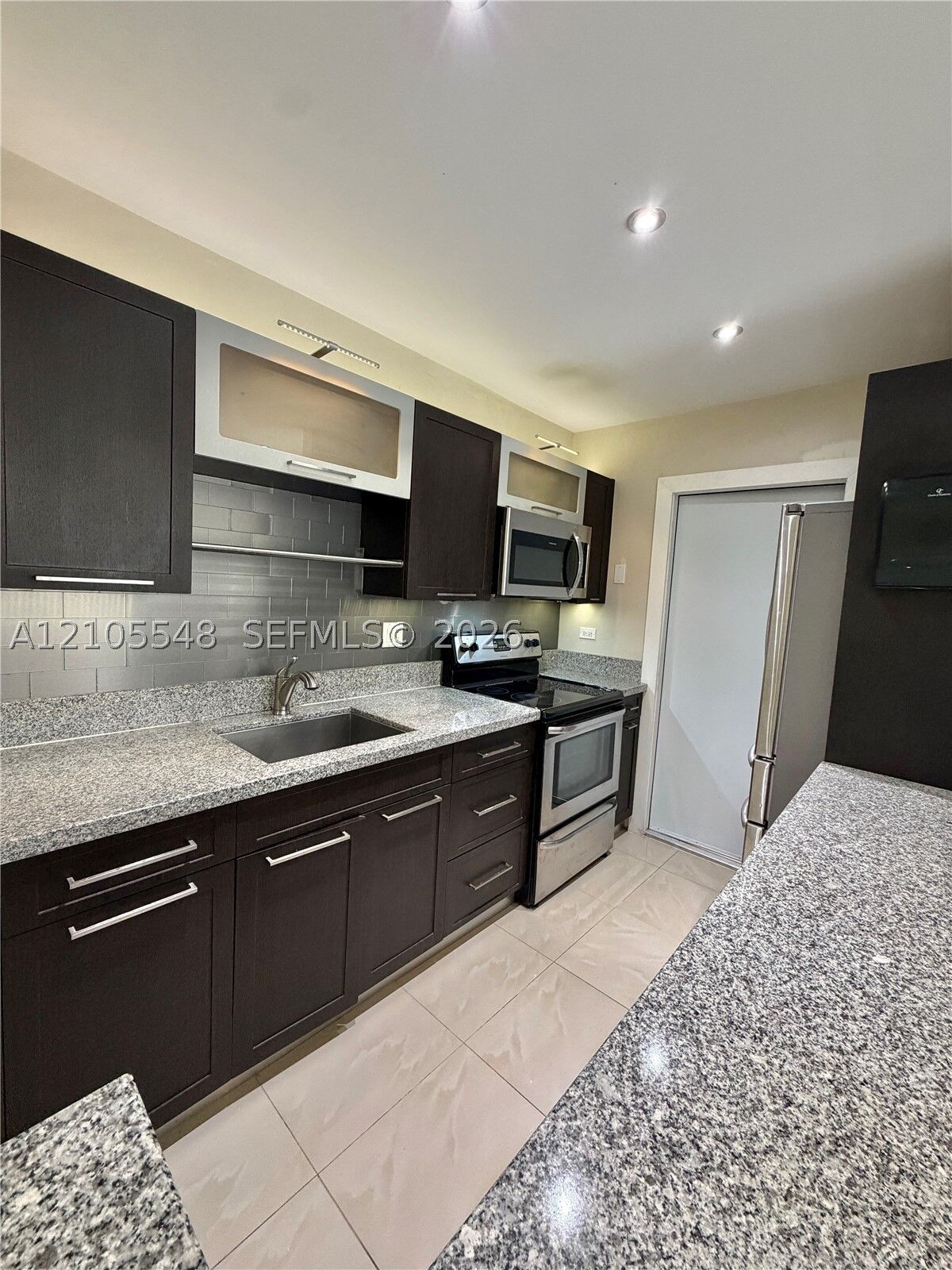 Property Photo:  13872 SW 90th Ave 210-Ff  FL 33176 
