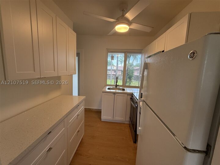 Property Photo:  1201 SW 13th St 1205  FL 33145 