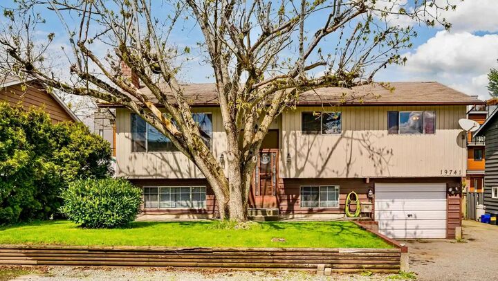 Property Photo:  19741 54A Avenue Main  BC V3A 3W4 