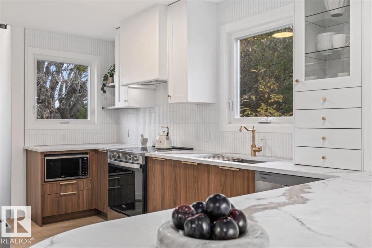 Property Photo:  8671 76 Street NW  AB T6C 2K1 