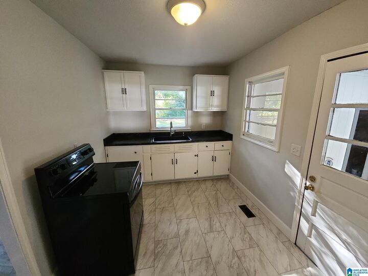 Property Photo:  3810 1st Avenue  AL 35405 