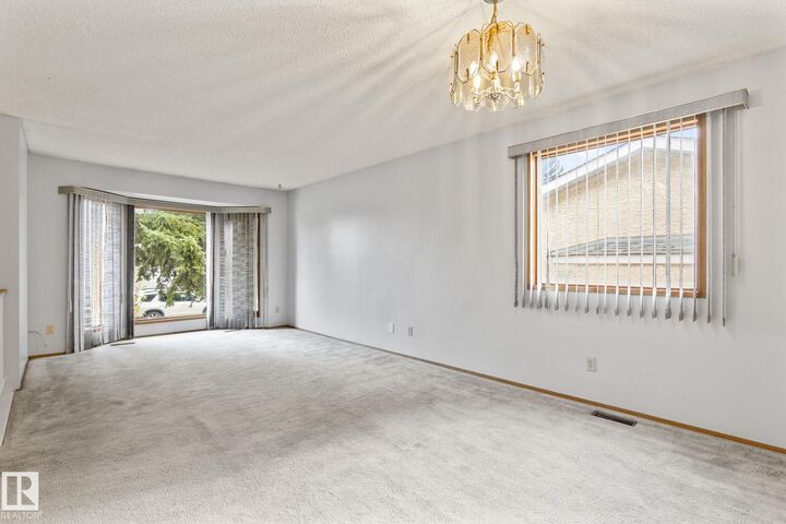 Property Photo:  1416 49A Street NW  AB T6L 6H6 