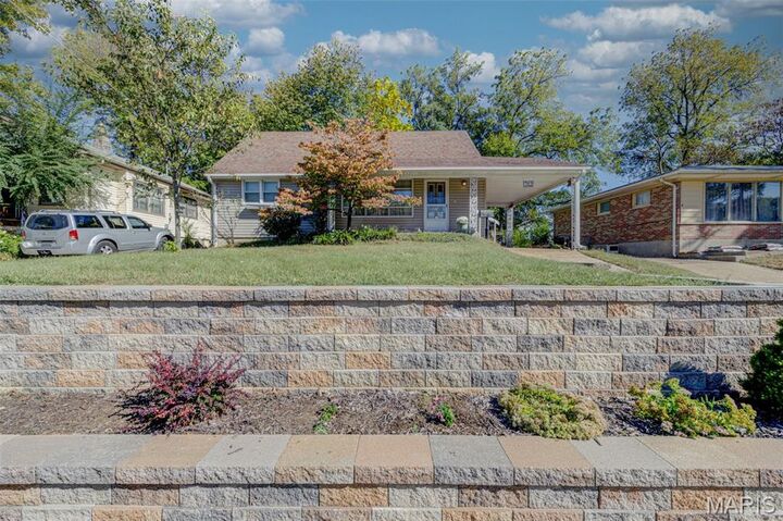Property Photo:  312 Saint Louis Avenue  MO 63135 