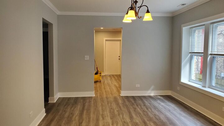 Property Photo: 6707 N Artesian Avenue 1 IL 60645