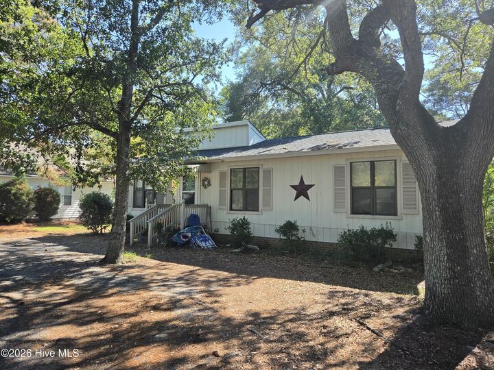 Property Photo:  7503 E Oak Island Drive  NC 28465 