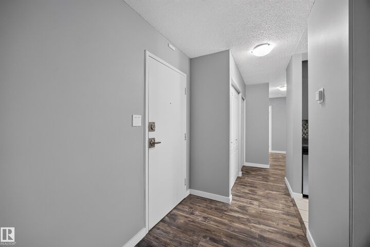 Property Photo: 11245 31 Avenue NW 27 AB T6J 3V5