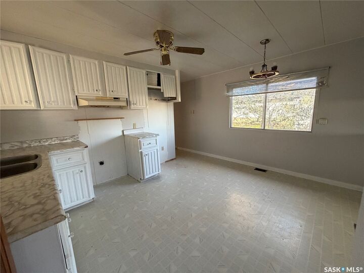 Property Photo:  241 30th Street W  SK S0M 0E0 