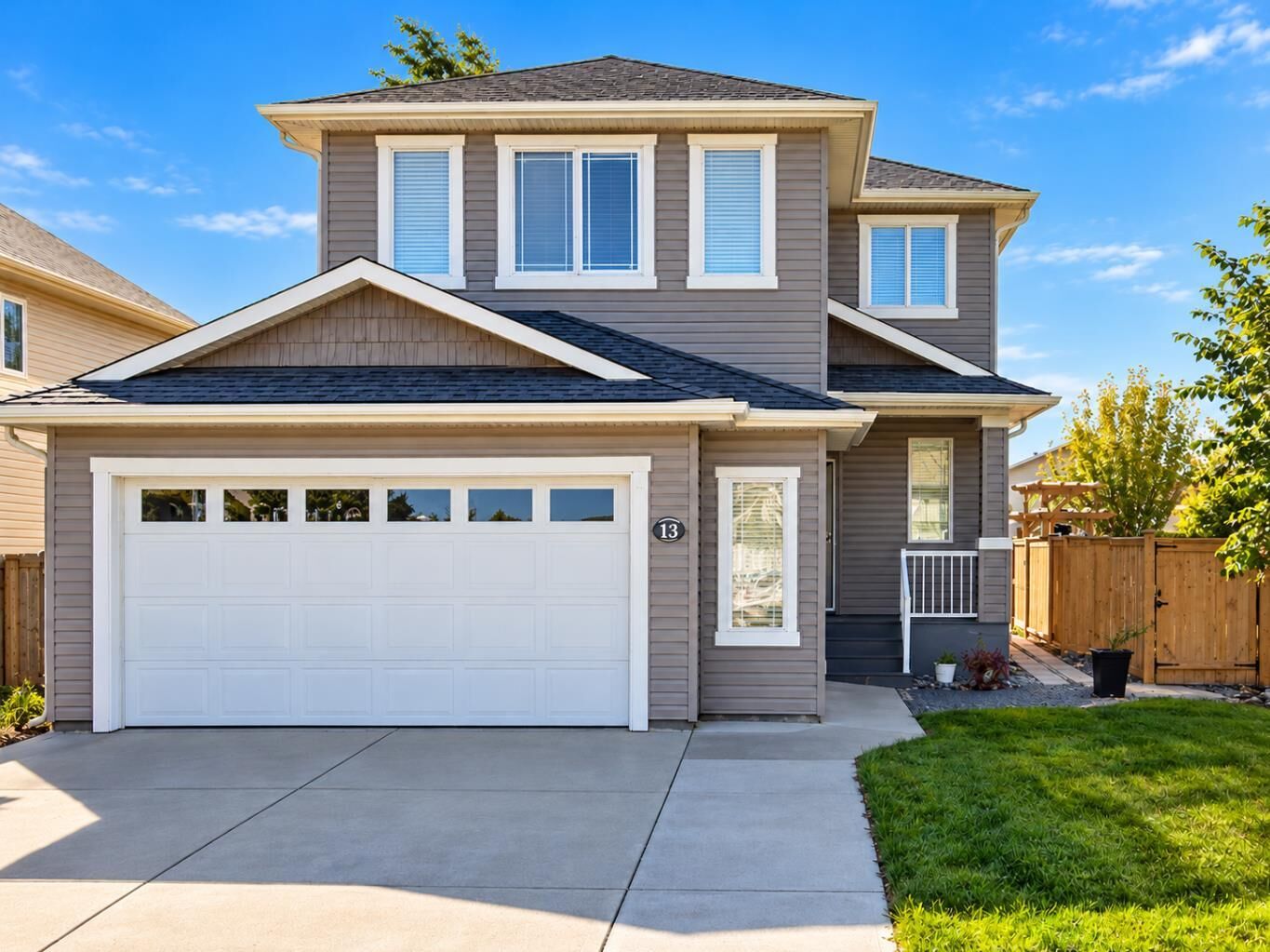 Property Photo: 14 Thyrza Burkitt Place AB T1H 5M5