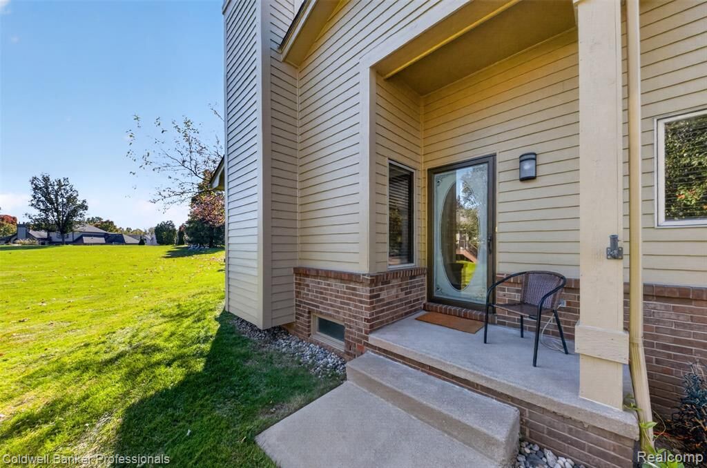 Property Photo: 8421 Solca Drive 33 MI 48386