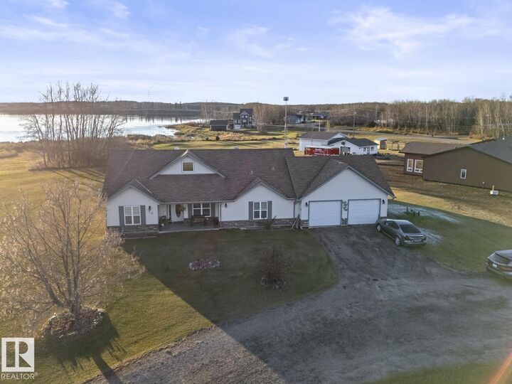 Property Photo:  62412A 420A Range Road  AB T9M 1P2 