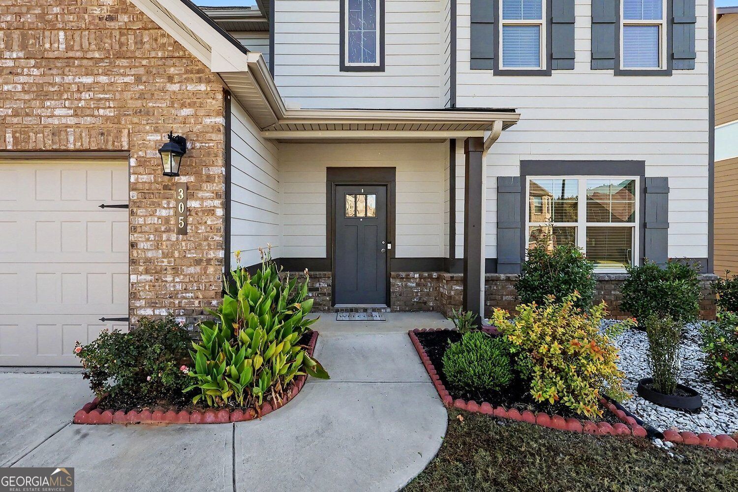 Property Photo:  305 Eleanora Crossing  GA 30052 