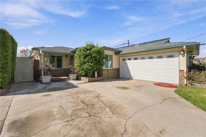 Property Photo:  13041 Corrigan Avenue  CA 90242 