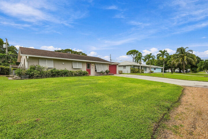 Property Photo:  4400 Crestdale Street  FL 33410 