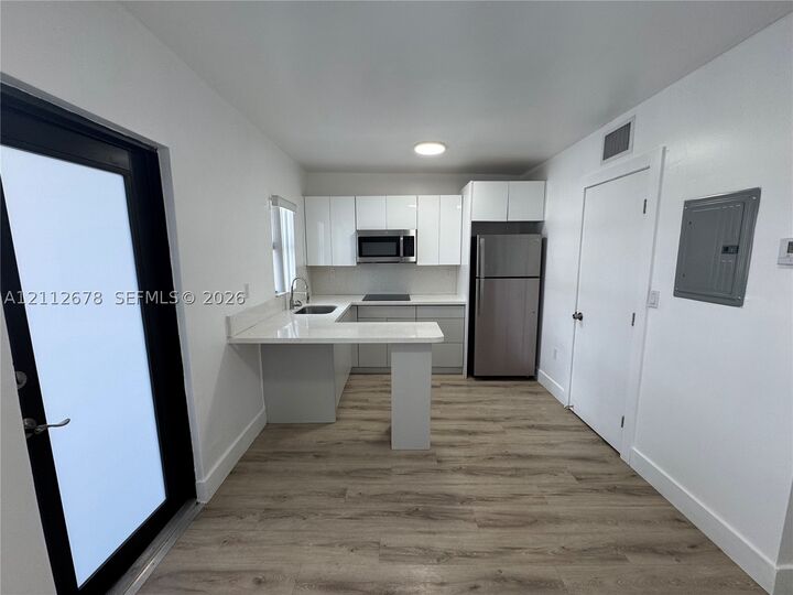 Property Photo: 1969 NW 2nd Ct 13 FL 33136