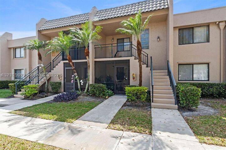 Property Photo: 390 Racquet Club Rd 202 FL 33326
