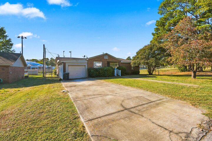 Property Photo:  613 Broad St  AL 35674 