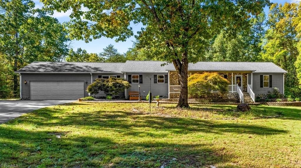 Property Photo:  4859 Hearthside Drive  NC 27370 