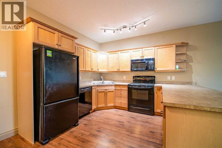 Property Photo:  2609 11 Avenue  AB T9W 0A3 