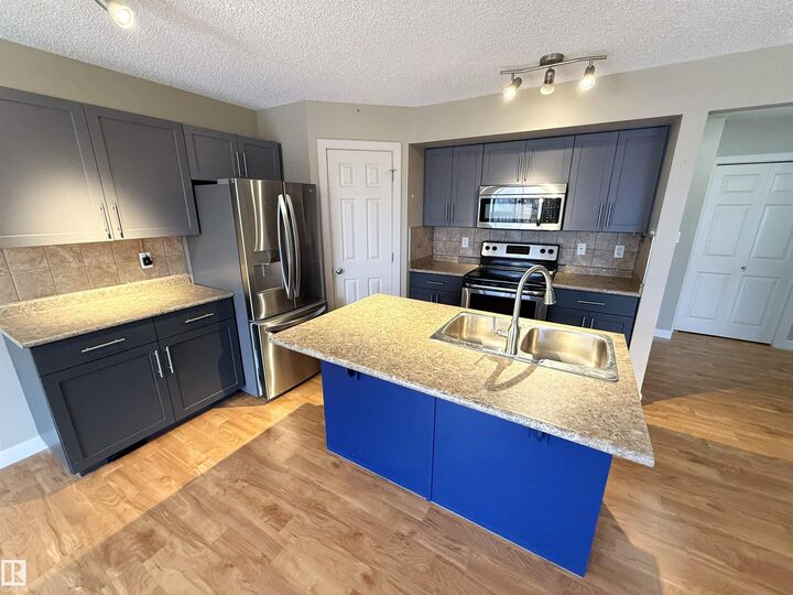 Property Photo:  8602 Southfort Boulevard 11  AB T8L 0J8 