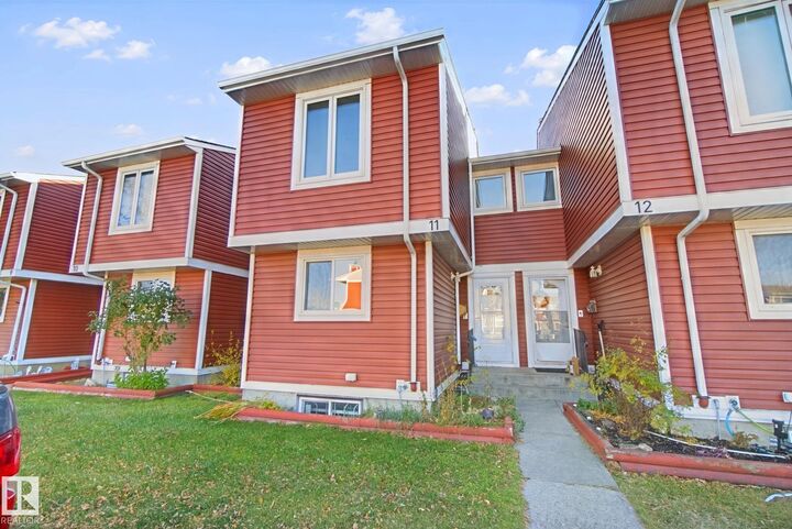 Property Photo:  4707 126 Avenue NW 11  AB T5A 4K4 