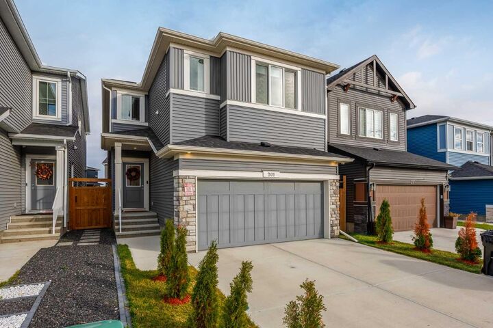 Property Photo:  201 Creekstone Path SW  AB T2X 4Z4 